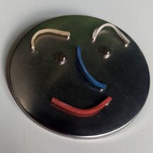 FaceBlik14 Een Smiley die je kunt laten lachen of boos kijken of..